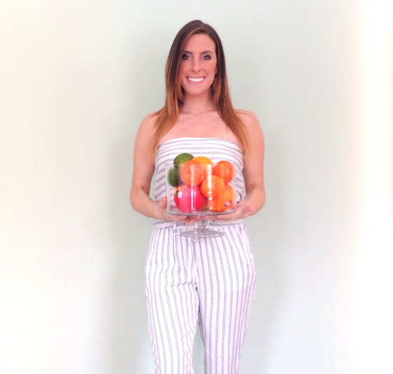 Just me, holding a bowl of fruit. 